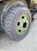 TI-101 | TI-101 9.00 x 20 Military Tread NDT Bias Ply Tire Mounted on 6 Hole Budd Rim  (3).jpg