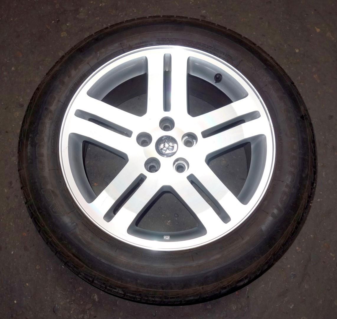 TI-244 | TI-244  BF Goodrich Advantage TA 22560R18 Tire Mounted on 5 Hole Dodge Rim  Wheel Used (2).JPG