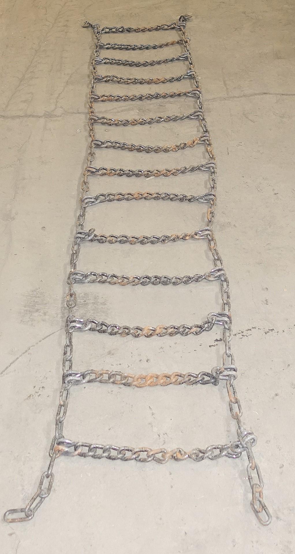 TI-278 | TI-278 Quik Grip QC2249CAM Tire Traction Chain (1) (Large).JPG
