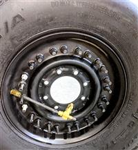 TI-1834 | TI-1834 BF Goodrich Baja TA 37X12.50R16.5LT Tire Mounted on 24 Bolt Rim with CTIS - 100 Tread HMMWV (8).jpg