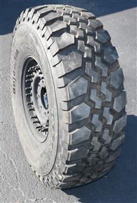 TI-1858 | TI-1858  BF Goodrich Baja TA 37X12.50R16.5LT Tire Mounted on 24 Bolt Rim 90% Tread HMMWV (1).JPG