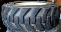 TI-1885 | TI-1885  Tire Titan HD 2000 II 10-16.5 NHS on 7 Hole Rim Industrial Tire Skid (10).JPG