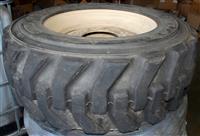 TI-1885 | TI-1885  Tire Titan HD 2000 II 10-16.5 NHS on 7 Hole Rim Industrial Tire Skid (4).JPG