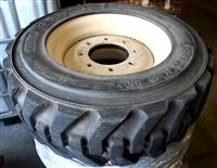 TI-1885 | TI-1885  Tire Titan HD 2000 II 10-16.5 NHS on 7 Hole Rim Industrial Tire Skid (9).JPG